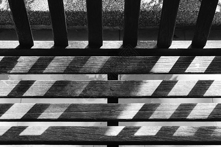 黑色和白色花园的木板 日光和阴影座位家具长椅椅子图片