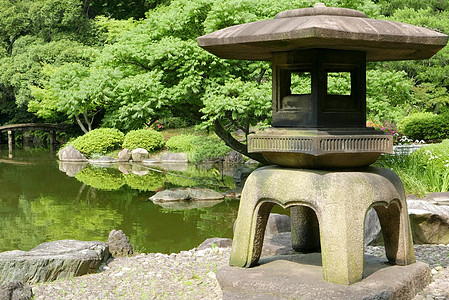 日本户外石器灯笼和泽园湖树木农村鸭子花园公园建筑季节黑藤反射土地图片