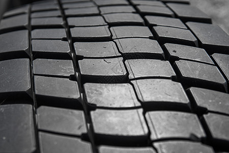 汽车轮胎保护剂 一些汽车轮胎 特写汽车移动新车轮轮胎表面的视图 汽车工业商业运输运输用不同花纹和类型的轮胎宏观水平圆形黑色车辆旅图片