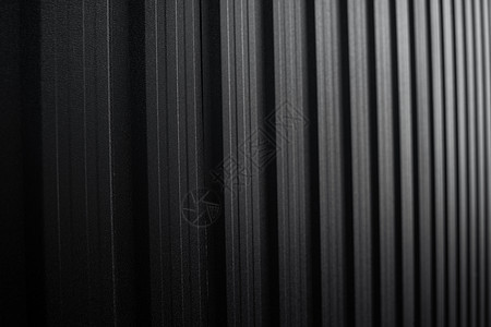 墙壁的黑色波纹金属板表面 镀锌钢背景硬件金属瓦楞控制板建造建筑盘子镀锌屋顶栅栏图片
