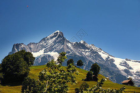 环绕瑞士的研磨山丘草地山脉农村高山旅游冰川远足岩石高地国家图片