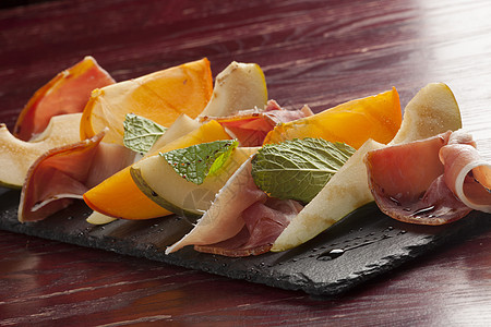 帕尔马火火炉猪肉薄荷火腿自助餐水果熏制沙拉美食橙子图片