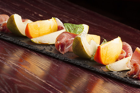 帕尔马火火炉火腿食物橙子熏制柿子猪肉美食自助餐沙拉图片