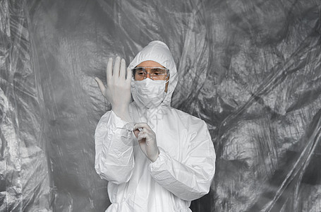身着白色防护服 面具 眼镜和橡胶手套的医生已准备好在冠状病毒大流行威胁时帮助人们 冠状病毒 covid 19 的流行病 呼吸器医图片