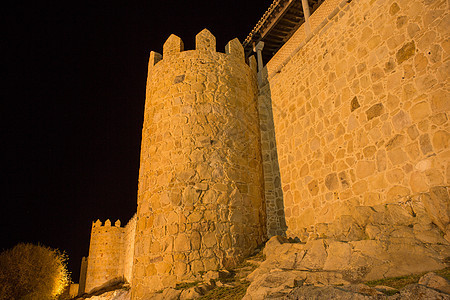 晚上在西班牙阿维拉城堡堡垒石墙建筑学废墟地标城市街道墙壁吸引力图片