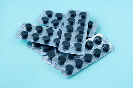 活碳圆形疾病吸水性蓝色生产药物腹泻药店健康产品图片