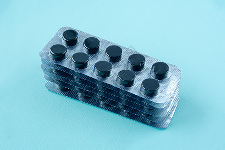 活碳水疱吸水性治疗健康中毒圆形疾病包装木炭蓝色图片