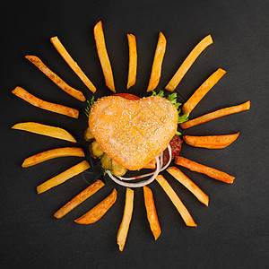 黑色的心形汉堡包牛肉食物午餐包子汉堡炙烤小吃太阳蔬菜薯条图片