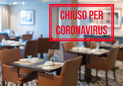 现代餐厅 餐桌特写 用意大利语签名说因Corona病毒特写图片