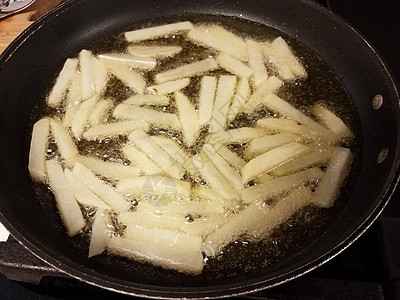 炉灶煎锅油炸薯条午餐小吃液体油炸土豆烹饪平底锅气泡火炉图片