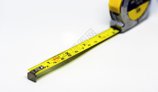 可逆的黄色金属测量胶带 以厘米和脚表示的度量值毫米木工公用事业工具木匠构造仪表工程建筑承包商图片