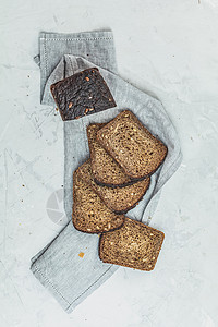在家烤的全麦面包饮食营养种子食物包子谷物美食蓝色面粉面包图片