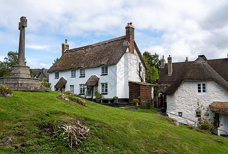 德文Lustleigh村绿色地带的荒原小屋街道建筑绿地村庄国家山坡乡村屋顶石头出租屋图片