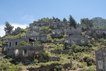 土耳其村的鬼城 废弃房屋和废墟旅游遗产地标建筑岩石古董场景历史性教会天空图片