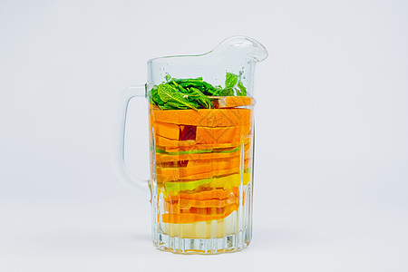 有柑橘水果和白底薄荷的大型玻璃罐厨房摄影产品饮料玻璃柚子配料解酒宿醉柠檬图片
