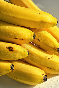 一群生来成熟的黄香蕉蔬菜黄色热带阳光日出工作室食物图片