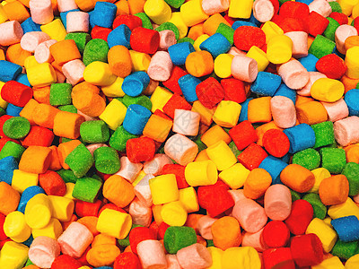 多彩多彩的糖糖 最顶端风景 平坦的床铺 美味甜食的背景绿色食物黄色糖果蓝色味道甜点红色彩虹图片