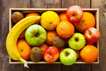 果实收成 苹果 橙子 柠檬 基威 香蕉 硬木板收藏水果奇异果盒子食物平铺图片