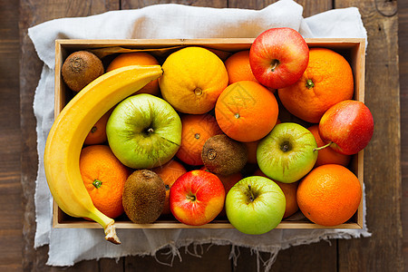果实收成 苹果 橙子 柠檬 基威 香蕉 硬木板奇异果水果食物盒子收藏平铺图片