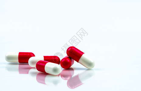 白种背景的红白胶片药丸 抗生素疾病药物抗菌剂药片治疗疼痛预算感染医院剂量图片