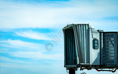 商业航空公司在阿盖机场起飞后架起喷气桥飞机空气建筑学捷径加载出租车喷射旅游假期货运图片