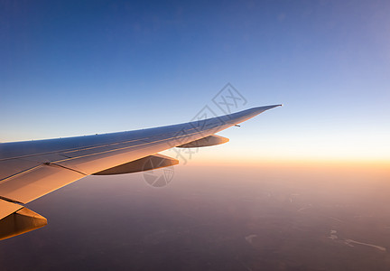 空中飞机在蓝天飞翔 风景优美航空公司气氛紫色航空天空航天地球商业天堂旅游图片