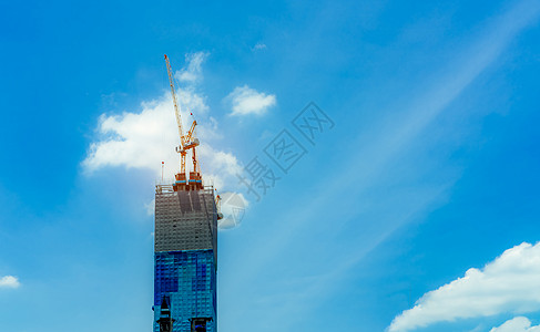 有起重机和建筑的建筑工地 房地产业工作摩天大楼住宅太阳机器金属城市商业财产卷轴图片