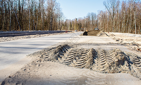 建造新的现代道路蓝色机器工作机械基础设施城市土壤碎石挖掘路面图片