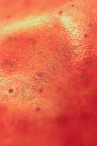 红梨表面纹理背景 宏特写宏观水果红色背景图片