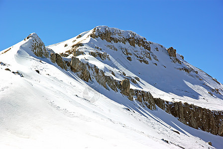 山顶山顶雪层环境蓝色天气首脑场景岩石风景顶峰高山高度图片