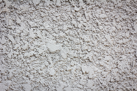 参差不齐的喷砂混凝土墙纹理背景材料裂缝地面爆破建筑石膏水泥石头乡村图片