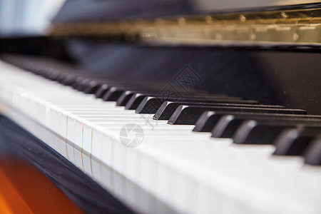 钢琴键盘特写线条曲调乌木音乐艺术旋律歌曲钥匙琴键笔记图片