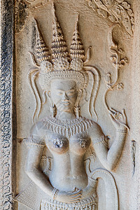 飞天舞者雕刻在石头上 遍布在吴哥窟 世界上最大的宗教寺庙建筑群纪念碑 的墙壁上 暹粒 柬埔寨 联合国教科文组织世界遗产风格观光帽图片