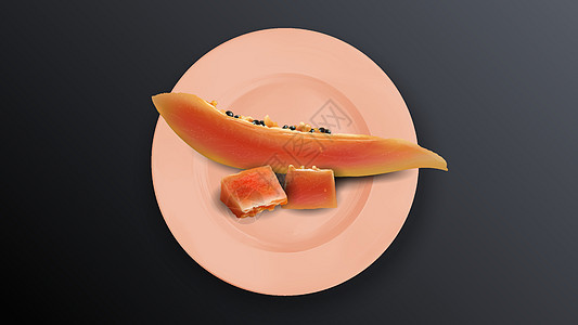 粉红色盘子上木瓜片的组成图片