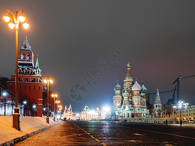 著名的地标  在克里姆林宫红广场的圣巴西尔大教堂 俄罗斯莫斯科冬季晚宴圆顶天空宗教首都鹅卵石游客旅游建筑观光教会图片