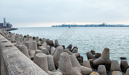 具有防水裂口的二次海岸线海岸旅行地平线支撑海堤障碍海景蓝色建造图片