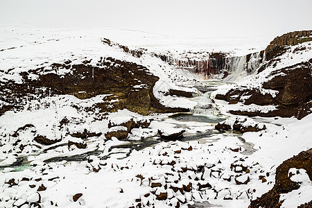 Snaedevofos瀑布 冰岛白色水平风景岩石旅行下雪公园图片