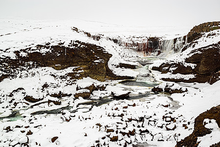 Snaedevofos瀑布 冰岛白色水平风景岩石旅行下雪公园图片