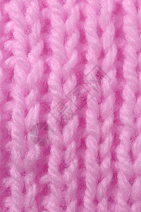 粉色羊毛针织质地 垂直编织钩针详细行 毛衣纺织背景 微距特写图片