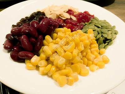 蒸黄色玉米 红豆 向日葵籽 杏仁粮食食物沙拉水果谷物种子早餐蔬菜午餐饮食图片