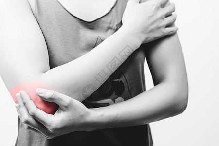 女性关紧妇女肘部疼痛受伤 在疼痛区红色突出亮点痛苦脊柱肌肉手臂皮肤治疗保健压力药品肩膀图片