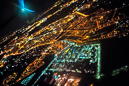 城市的黑暗背景视图与飞机的灯光 城市的夜晚灯光辉光旅行天线飞机场景观客机航班街道天空鸟瞰图图片