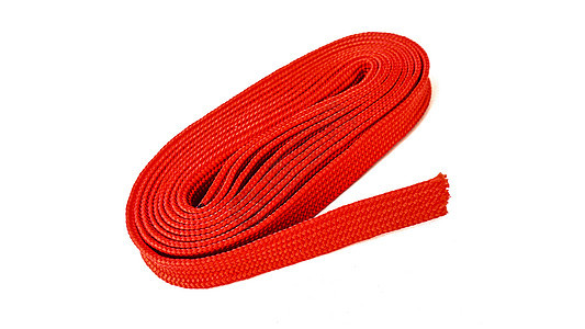 红色的红绳在白色背景上 红色的织物绳折叠在圆圈安全尼龙亚麻领带材料卷曲羊毛棉布工具图片