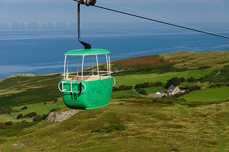 一辆有电缆的汽车gondola旅行公园山腰滑雪天线升降椅吸引力蓝色索道天空图片