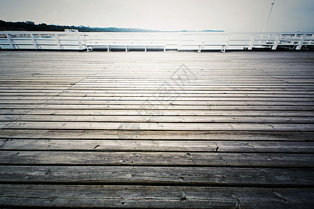 波兰索波特的木质码头蓝色天空晴天太阳假期海岸池塘木头全景日出图片