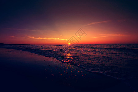日落在海面上冲浪假期海滩地平线支撑海岸反射热带海洋海浪图片