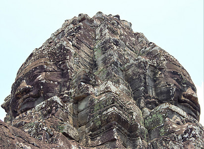 吴哥的石头脸 刺刀 刺刀 安哥罗瓦特卡姆博迪亚贾亚瓦尔曼七世寺庙雕塑雕像收获石头废墟考古学遗产旅游地标图片