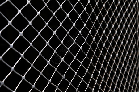 金属栅栏网监狱栅栏纤维宏观工业安全塑料绿色植物警察局废料背景图片
