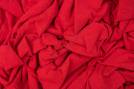 褶皱的羊毛 纺织产品 抽象的红色背景图片