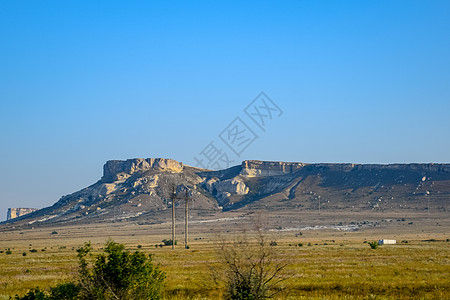 克里米亚半岛的白山 白悬崖场景土地爬坡高地天空台面下坡树木海岸线全景图片